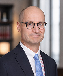 Of Counsel - John Rossman