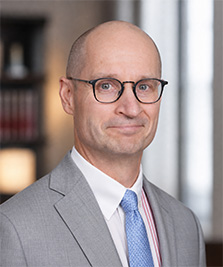 Of Counsel - John Rossman